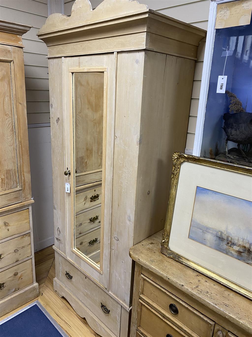 An Edwardian pine mirrored door wardrobe, length 94cm, depth 49cm, height 211cm